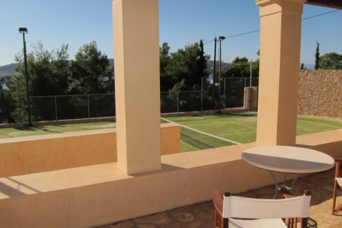 THE TENNIS COURT FROM THE GUEST ROOM'S TERRACE